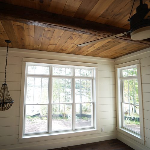 Lake-home-Master-bedroom-beams-1